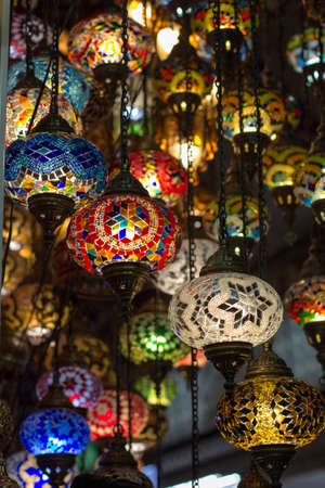 Group of traditional multicolored turkish lamps hanging at the Grand Bazaar in Istanbul, Turkeyの写真素材