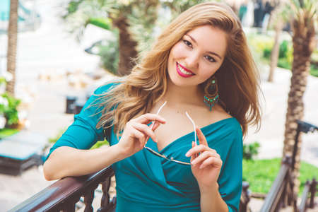 Smiling young woman in Dubaiの写真素材