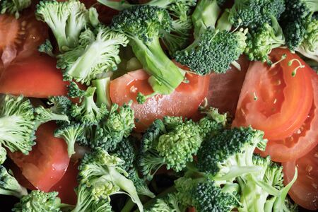 Broccoli and tomato salad. Fresh vegetable salad.の写真素材