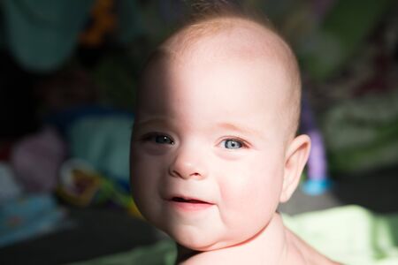 Smiling baby. Emotional child. Newborn smiling baby.の写真素材