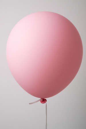 Air balloon. Pink ball on a string. Balloon for the holiday.の写真素材