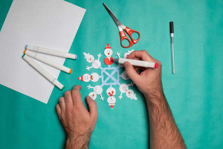 Step 13. DIY Christmas paper snowflake. Christmas craft step by step instructions.の写真素材