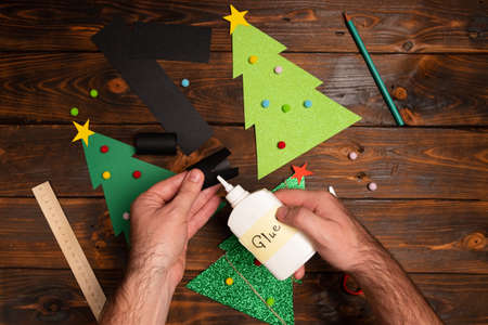 Christmas tree paper craft. Christmas craft step by step photo instructions. Step 14. Children's art...