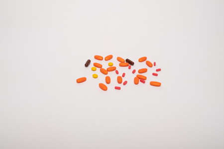 Medical pills, capsules, vitamins. Background from colored pills.
