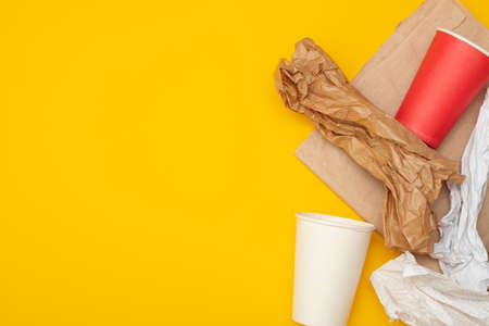 Eco-friendly disposable packaging, waste recycling concept, paper and cardboard waste, rubish sort and plastic free lifestyle. Copy space.の写真素材