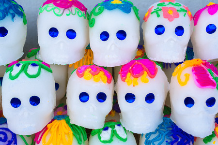 The colorful skulls will be taken to the altars of the dead.の写真素材