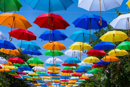 Umbrellas decorate the street.の写真素材