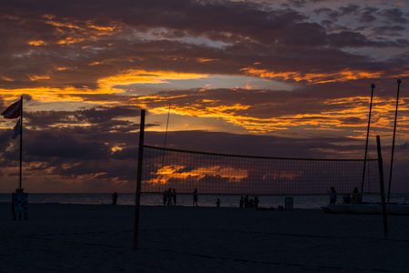 A sunset over the beach volleyball court.の写真素材