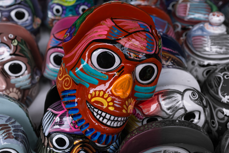 The skull head of bright colors stands out above the others.の写真素材