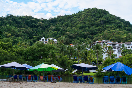 The houses on the mountain of the Juluapan lagoon in Manzanillo Colima are beautiful.の写真素材
