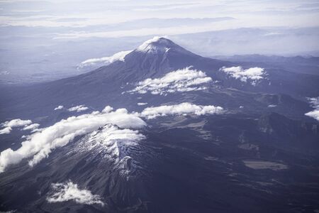Aerial landscape of the Popocatepetl and Iztaccíhuatl volcano in Mexico.の写真素材