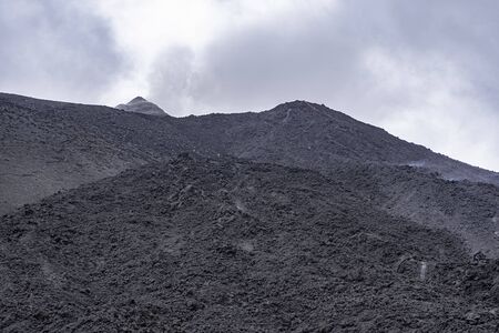 Landscape of the Pacaya volcano with its volcanic stones and rivers of fire.の写真素材