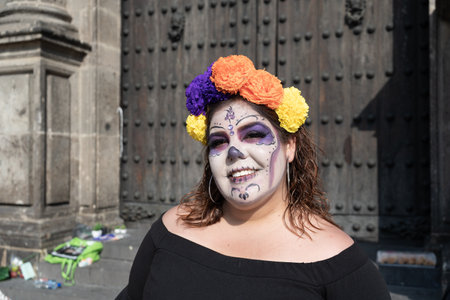 Guadalajara Jalisco - November 01, 2019: The young lady is posing happily with her face made up on the day of the dead in Guadalajara.のeditorial素材