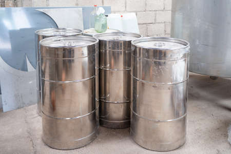 Steel drums to store the tequila in the factory.