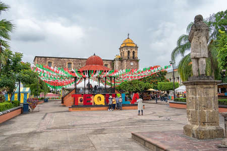 Tequila Jalisco, Mexico - September 14, 2021: Main Square of Tequila Jalisco with its Kiosko and its Santiago ApÃ³stol Parish.のeditorial素材