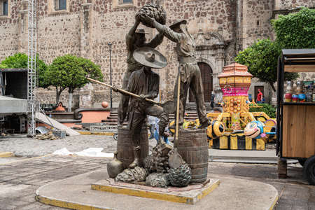 Tequila Jalisco, Mexico - September 14, 2021: Sculpture of Carlos Terres, three jimadores in the main square of the Magical Town of Tequila.のeditorial素材