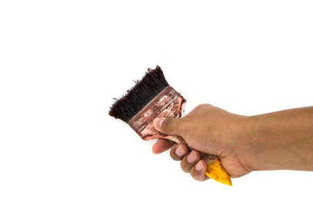 Male hand holding paint brushの写真素材
