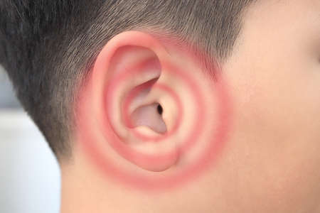 Hearing showing the ear of a boy human with sonic simulation technologyの写真素材