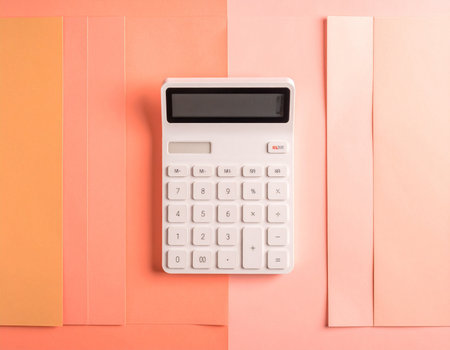 calculator on colorful paper background, business and finance concept.の素材