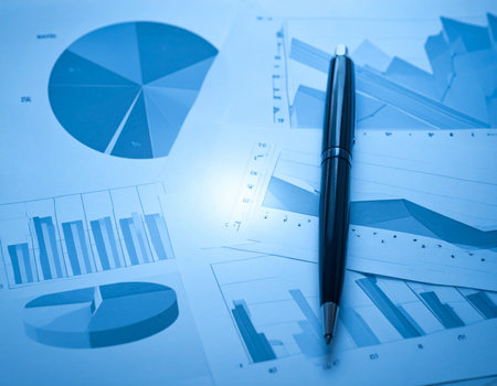 financial chart and pen on the table, closeup of business photoの素材