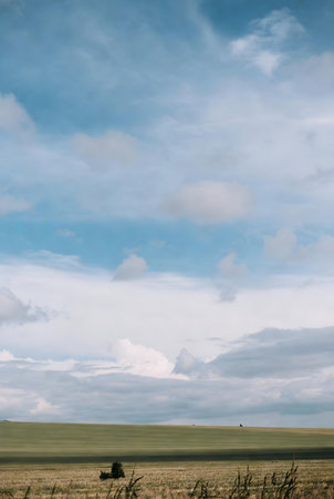 Landscape with blue sky and white clouds. Nature composition. Horizontal.の素材