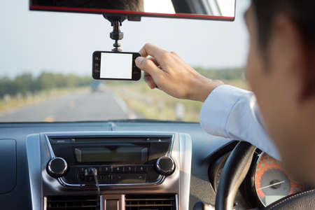 video recorder driving a car on highwayの写真素材