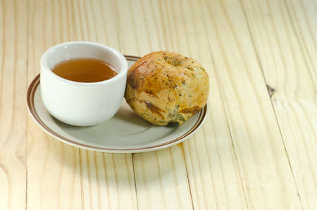 Soft bun bread with teaの写真素材