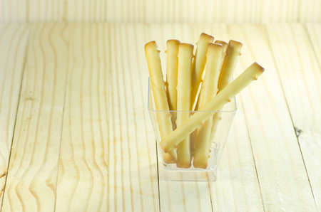 bread stick on wooden floorの写真素材