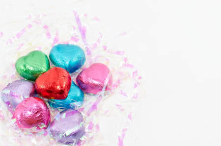 colorful  foil wrapped chocolate hearts for valentine's dayの写真素材
