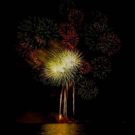 A firecracker is a small explosive device primarily designed to produce a large amount of noise.の写真素材