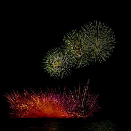 A firecracker is a small explosive device primarily designed to produce a large amount of noise.の写真素材