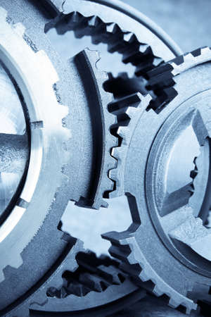 close up of the gears meshing togetherの写真素材
