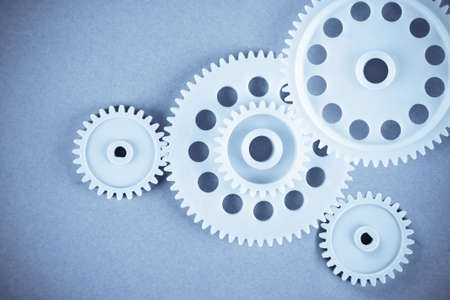 the gears meshing together(teamwork concept)の写真素材