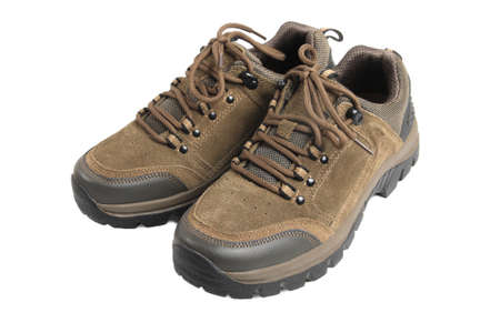 a pair of hiking shoes isolated on whiteの写真素材