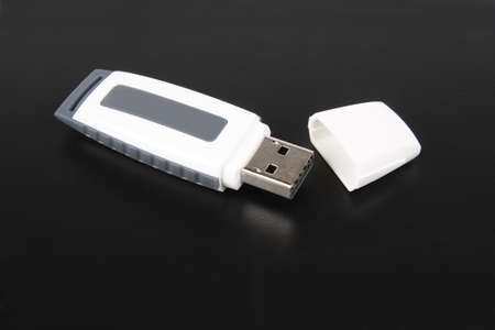 flash drive isolated on blackの写真素材