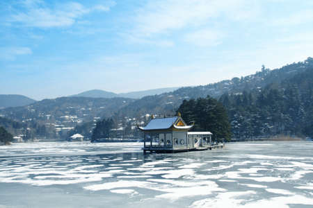the pavilion in the lake at winter in lushan ,Chinaの写真素材