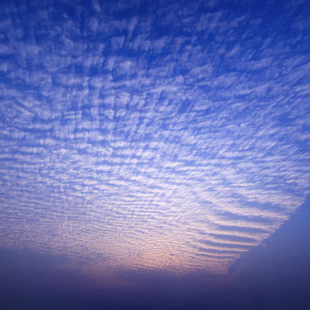 radial cloud with dramatic sky at sunsetの写真素材