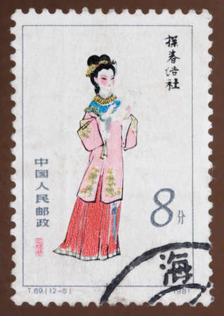 CHINA-CIRCA 1981. The stamp printed in China depicting traditional wear for girl, the image of the girl from the chinese classic Dream of Red Mansions.circa 1981.のeditorial素材