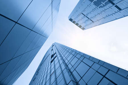 modern glass building with blue tone