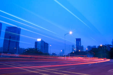  light trails on the building background in shenzhen,Chinaの写真素材