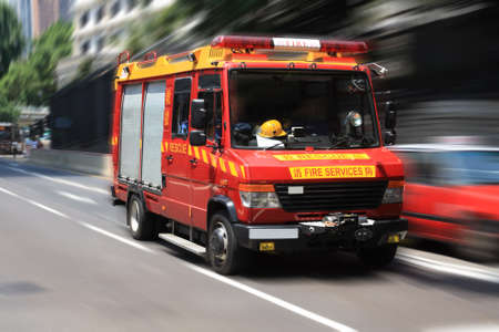 fire engine rushing down the street to the rescue 