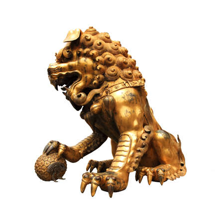 gilt lion statue isolated on whiteの写真素材