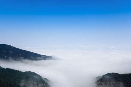 clouds and mist floating among in the mountain peak