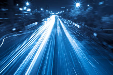 light trails on the street in rush hour traffic at nightの写真素材