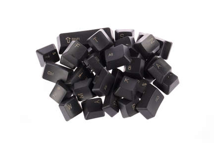 a pile of computer keys isolated on whiteの写真素材