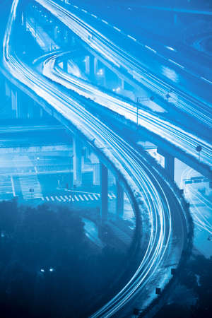 closeup of the light trails on grade separation bridge