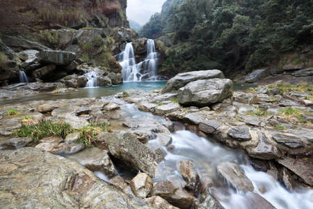 double waterfall and streaml in early spring