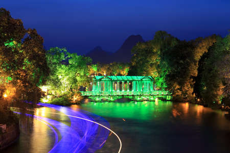 night scene of the glass bridge at banyan lake in guilin,Chinaの写真素材