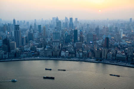 aerial view of shanghai bund at sunset from the oriental pearl tv tower の写真素材