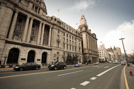old buildings with modern street in shanghai bund,Chinaの写真素材